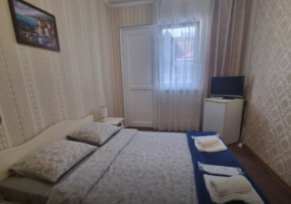 Гостиница Марина Адлер Номер Делюкс с кроватью размера «king-size»-1